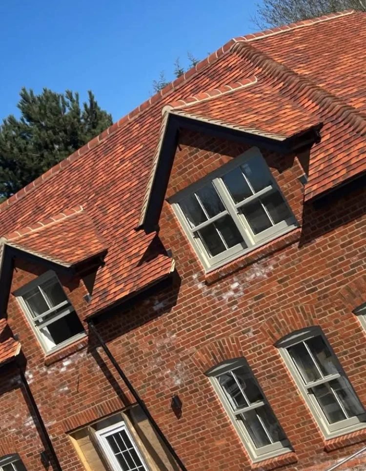 Heritage clay tile roof with dormers